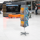 Revolving leaflet holder in use at an exhibition