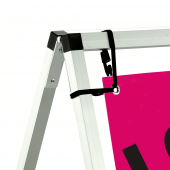 The frame secures with ground pegs and the banner attaches with bungee cords