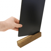 The chalkboard insert slots seamlessly into the stylish wooden base