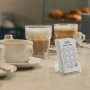 Portrait business card holder displaying loyalty cards in a café