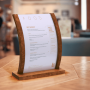 Table menu stand being used on a restaurant tabletop