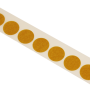 Clear adhesive dots on a strip