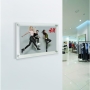 Wall mounted acrylic poster frames for retail