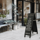 Use a narrow blackboard A frame to display offers and menus