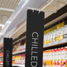 Magnetic banner hanger for aisle signs