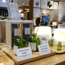 Portrait and landscape angled posters in a retail display