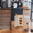 Table menu holder with six faces ideal for restaurants and cafes