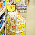 Retail dump bin displaying discounted bottles of mould spray