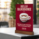 Wooden Card Holder Base displaying promotions on a tabletop