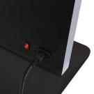 Digital advertising screen on a black base with mains cable