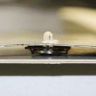 Slide the LED bulb through a pre-punched hole