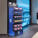 Bespoke branded display stand for retail - custom FSDU with header