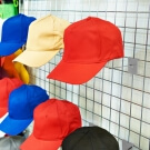 Gridwall hat display arm