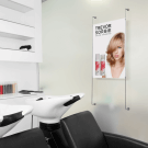 Wall to wall cables used within a salon's cable display system