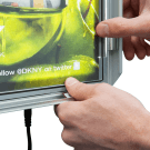 Illuminated poster display with slimline design
