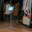 Use an LED backlit poster stand to draw attention to key products