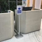 Use a poster display stand to display important notices