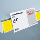 Central shelf talker for shelf edge labels