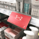 Shelf talker for displaying promotional messages on the shelf edge