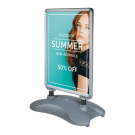 Use our waterproof outdoor posters with pavement signs