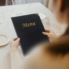 Traditional restaurant menu cover with reinforced edges