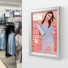 Display promotional messages in-store in a cost effective way