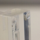 Apply the clear self adhesive rubber pads to your point of sale displays