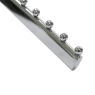 Metal stoppers prevent hangers from bunching up at the ends of the rail