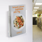 Wall mounted document holder with a portrait orientation