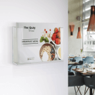 Wall mounted leaflet holder in clear styrene
