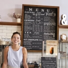 Large framed chalkboard used as a cafe chalkboard