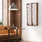 A wooden magazine rack has a stylish rustic aesthetic