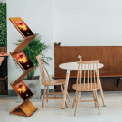 Wooden brochure stand with a zig zag design