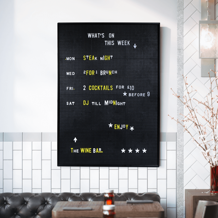Peg notice board used as a restaurant menu board
