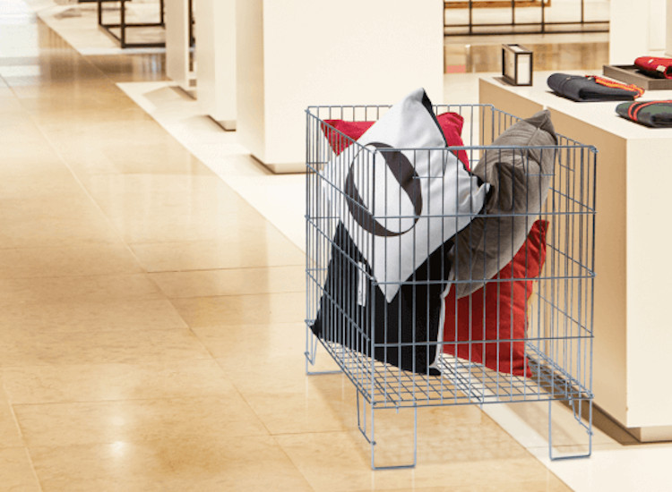 Wire dump bins in a department store holding cushions for impulse buys