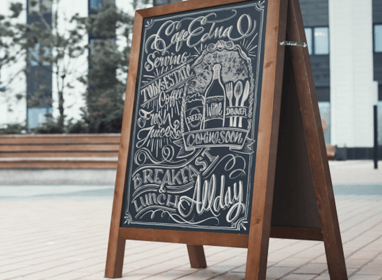 A frame chalkboard pavement sign