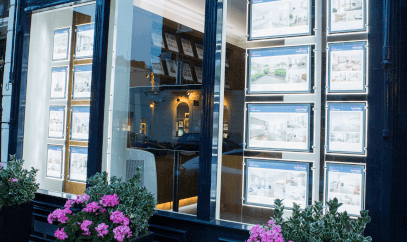 Illuminated estate agent displays