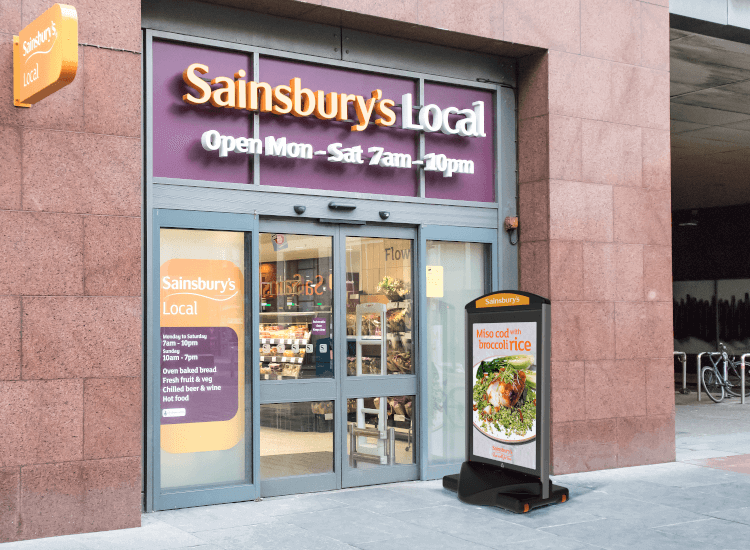 Supermarket pavement signs