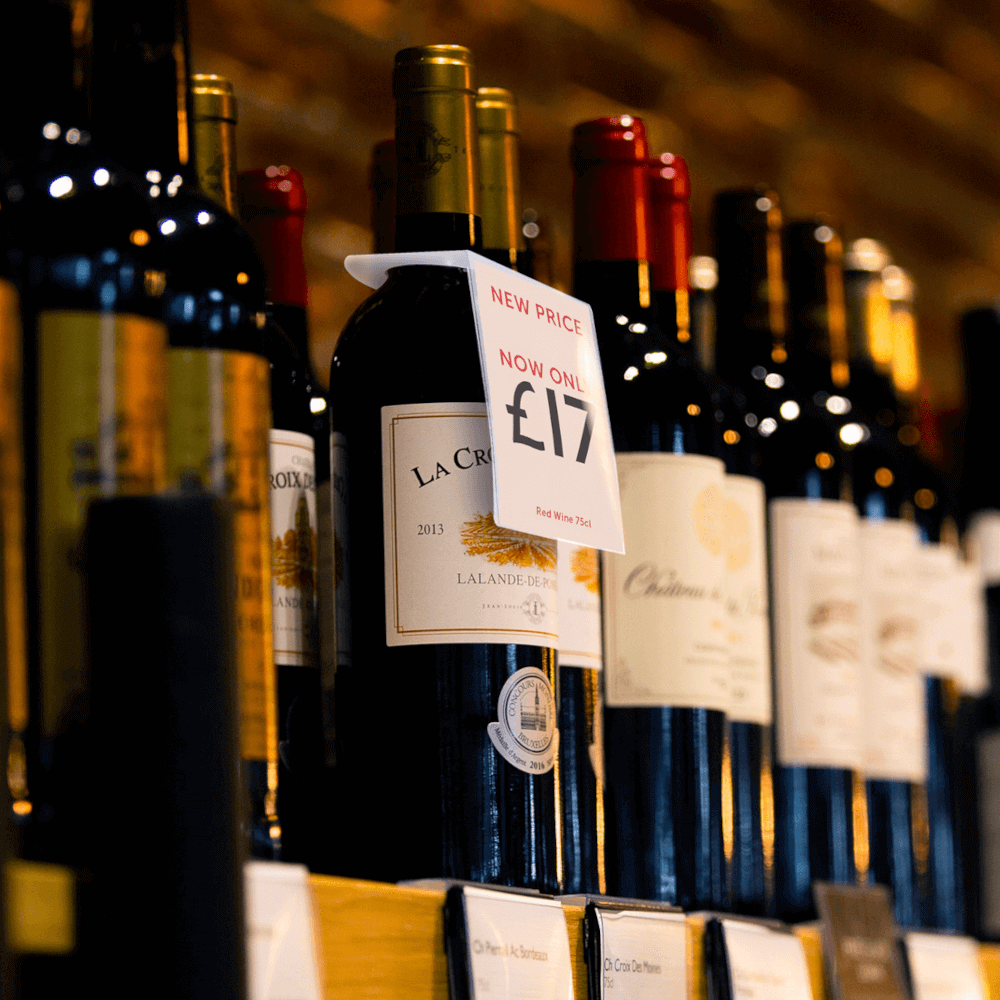 wine bottle neck ticket holder displaying individual price