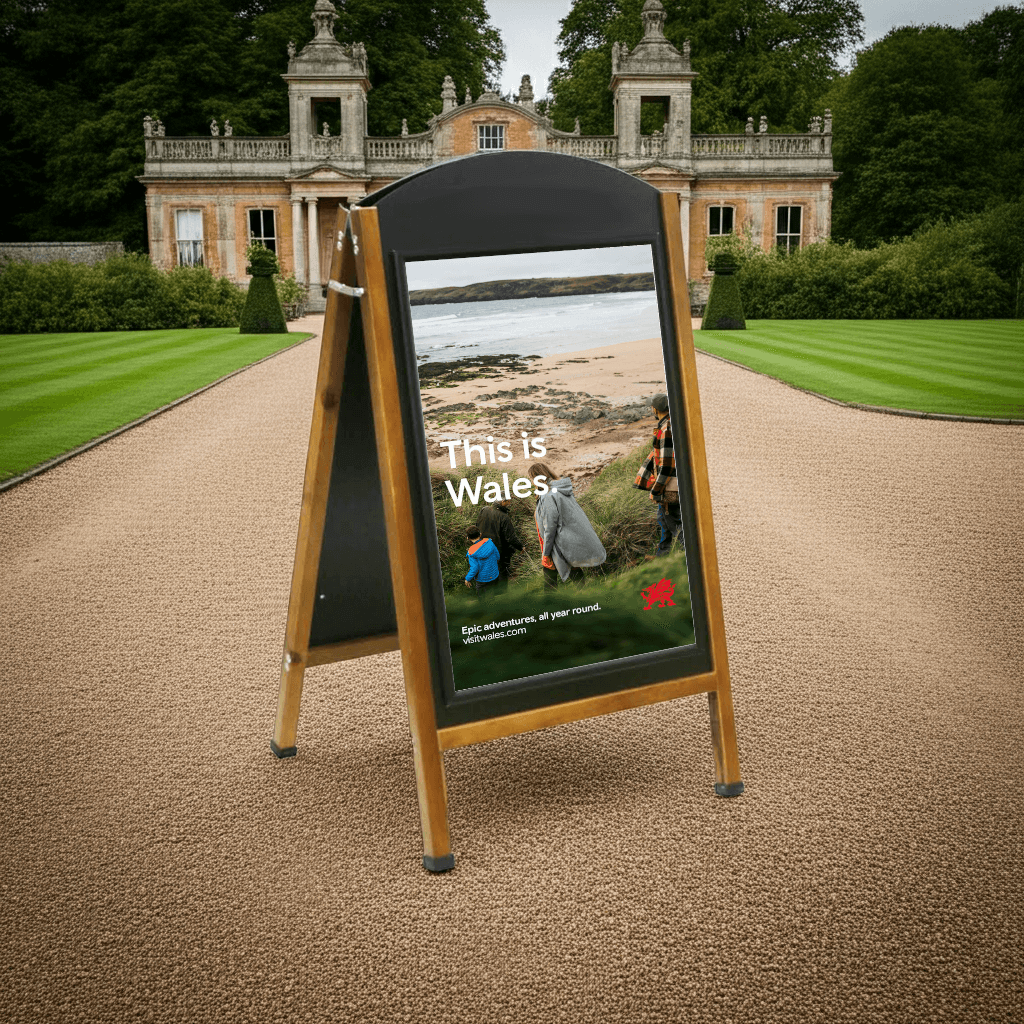 pavement sign outside stately home