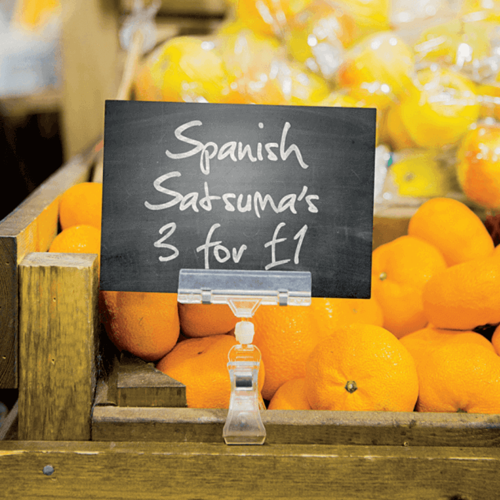 ticket clip for displaying prices for oranges in store