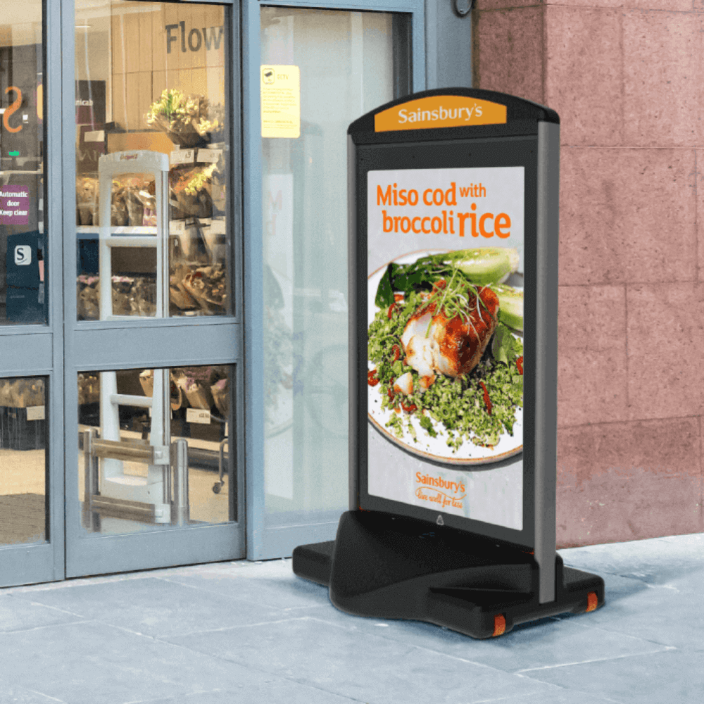 heavy duty pavement sign displaying recipe inspiration outside Sainsburys