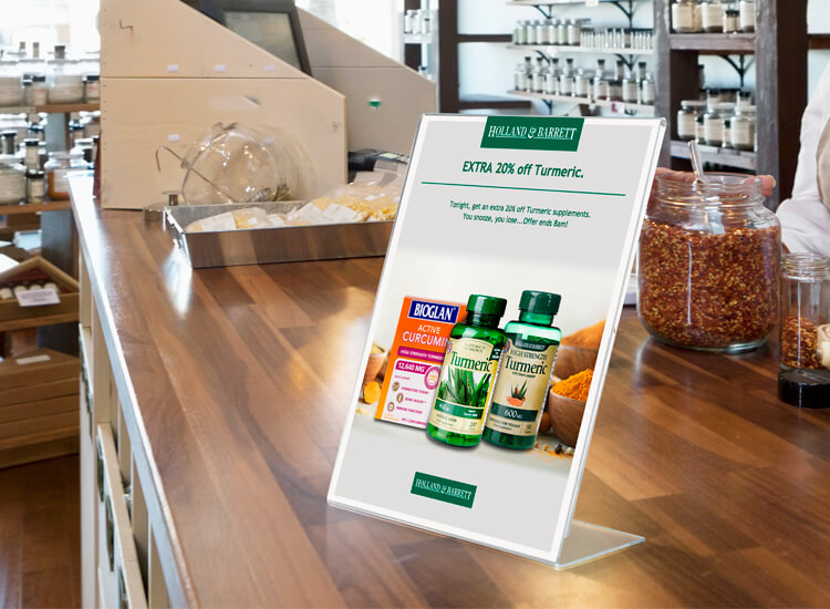 Countertop poster holders for checkouts
