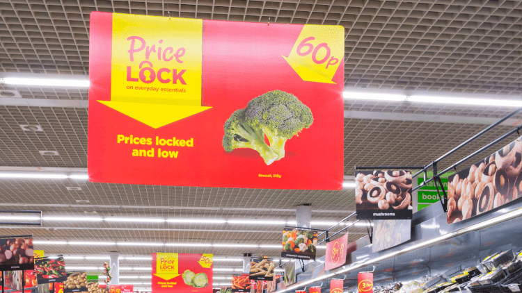 overhead signage in a supermarket