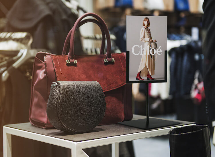 handbag promotional sign