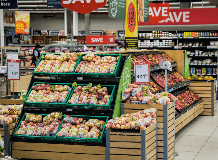 fresh fruit and vegetable display in a supermarket